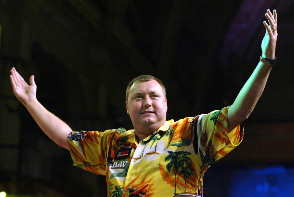 Wayne Mardle celebrates a high score